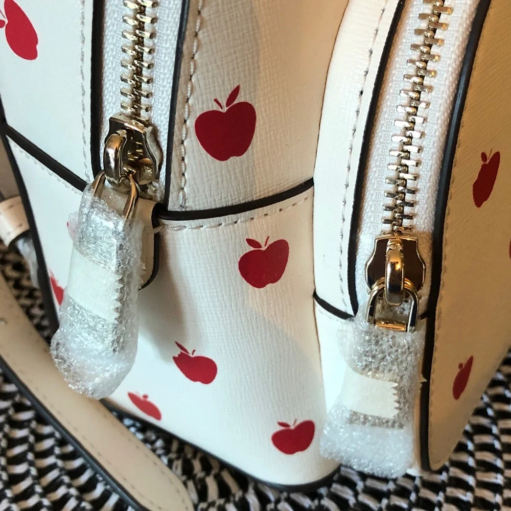 Authentic New with tags kate spade mini backpack with dust bag